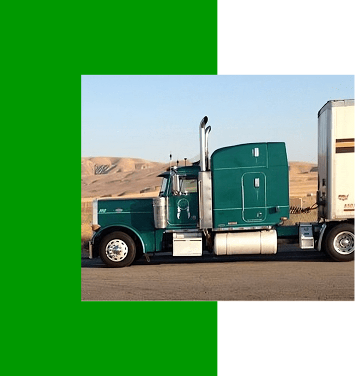 Classic green truck with trailer