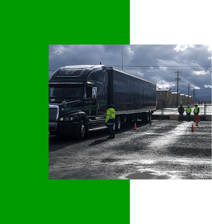 Truck at loading dock with workers